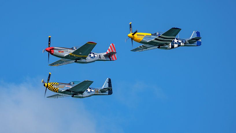 Formation of 3 North American P-51 Mustangs. by Jaap van den Berg