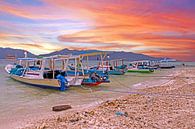 Traditional boats at Gili Meno in Indonesia with sunset by Eye on You thumbnail