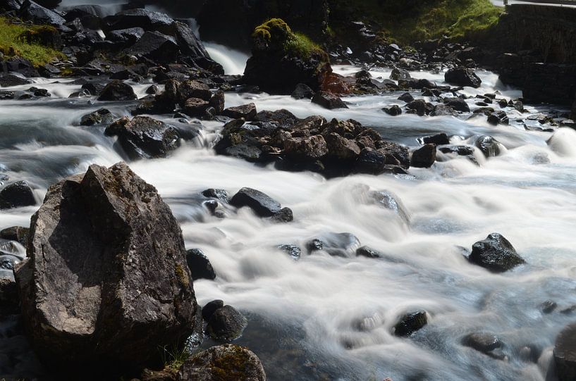Rock in the water by Gerben van den Hazel