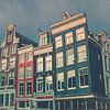 Grachten gevels in Amsterdam van peterheinspictures