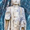 Buddha statue in front of a blue granite wall by 2BHAPPY4EVER.com photography & digital art