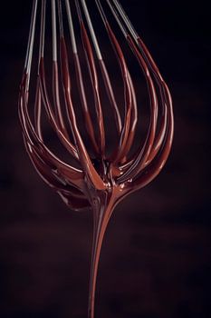 SF12468512 Vloeibare chocolade die van een garde afdruipt