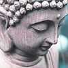 Buddha Kopf gegen blau / türkisfarbenen Hintergrund. von Wieland Teixeira