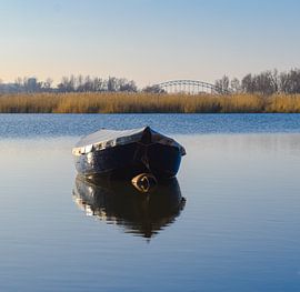 A little blue boat on the Waal by Caroline Drijber Guérain