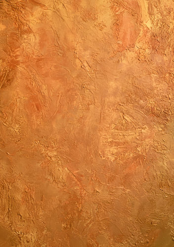 Textured wall surface in warm terracotta and earthy tones