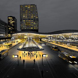 Bus square and Utrecht municipal offices during evening rush hour by Framed by Elisabeth