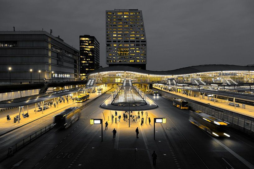 Bus square and Utrecht municipal offices during evening rush hour by Framed by Elisabeth