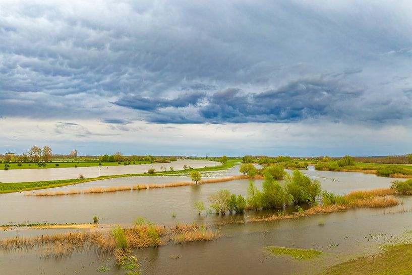 IJssel river with storm clouds above by Sjoerd van der Wal Photography