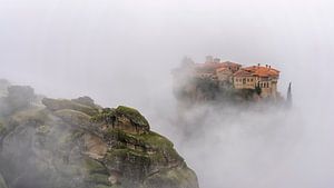 Meteora Monasteries in the mist by Teun Ruijters