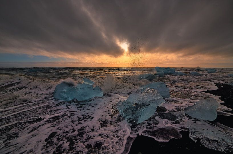 Diamonds on the beach at Jokulsarlon in Iceland by peterheinspictures