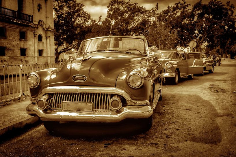 Vintage convertible car in Havana Cuba with sepia toning by Dieter Walther