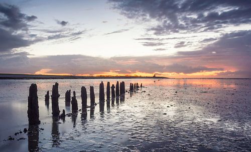 Waddenzee tijdens zonsondergang