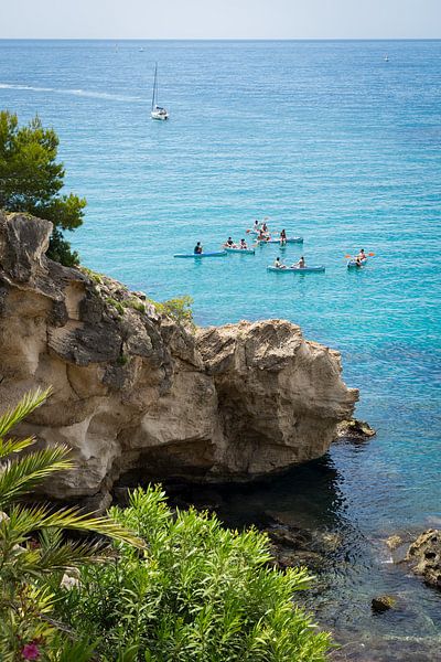 Cliffs and blue sea water in summer by Adriana Mueller