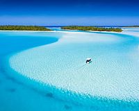 Arrival by boat in the lagoon of Aitutaki.