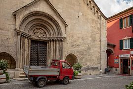 Door of Church in Gavia with pickup truck, Piedmont, Italy