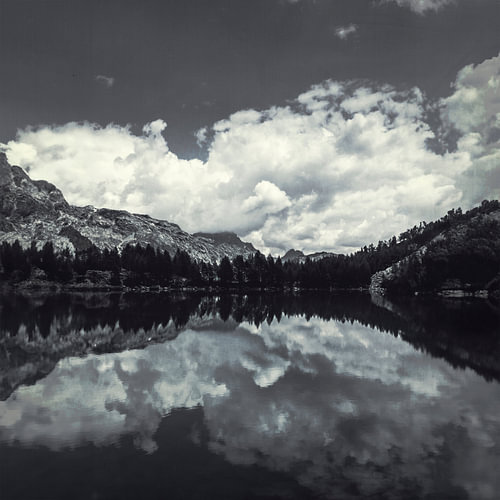 Alpensee Reflektionen