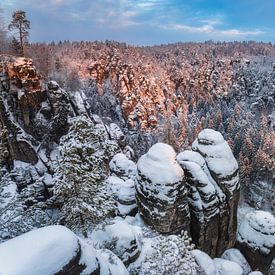 Snowy Elbe Sandstone Mountains by Daniela Beyer