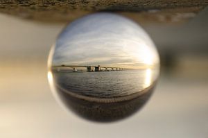 Zeelandbrug door een glazen bol van Annelies Cranendonk