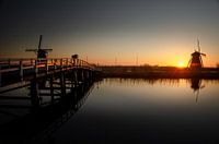 Photographer at sunrise in Kinderdijk, Holland