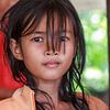 Cambodian girl looking into the camera by Eddie Meijer
