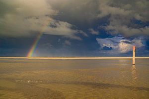 Regenboog op het strand van Texel in de Waddenzee van Sjoerd van der Wal Fotografie