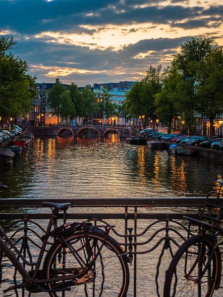 Sunset on the river in Amsterdam by Mustafa Kurnaz