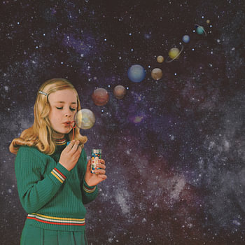 Anna blows bubbles planets