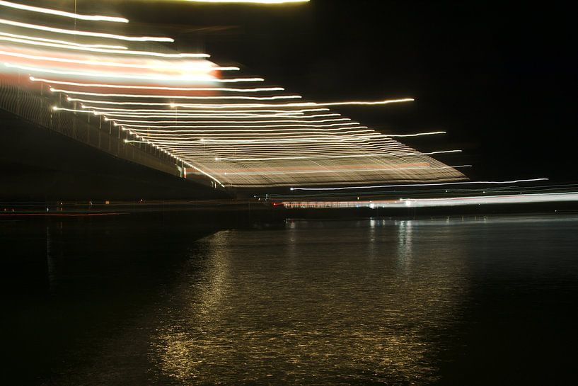 Lines of light above the bridge near Kampen by George van der Vliet