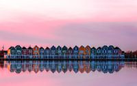Roze zonsondergang over de regenboog huizen, Houten