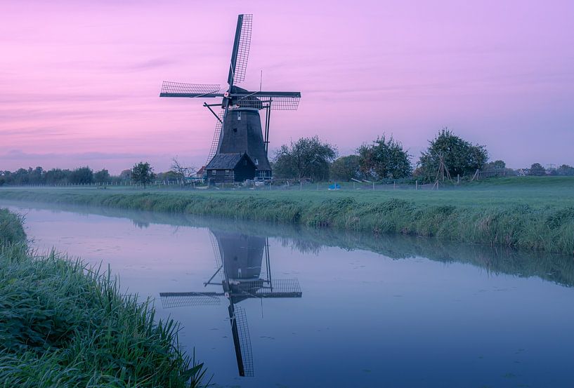 Zonsondergang met molen in Kinderdijk van Rick van de Kraats