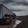 Arrival of heavy goods vehicles with bridge girders by Babetts Bildergalerie