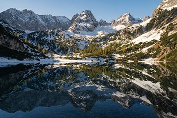 Panoramic picture of Seebensee in autumn with the first snow in the morning shortly after sunrise
