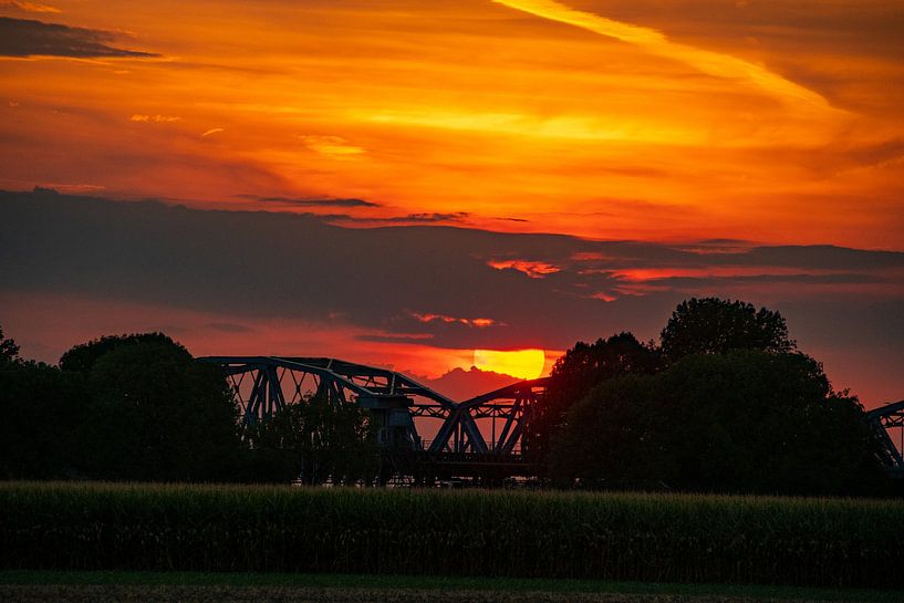 Sun behind John S. Thompson bridge by Michael van Eijk