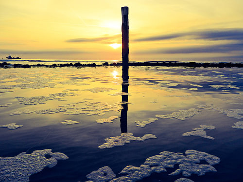 Zonsondergang op het strand van Hollum