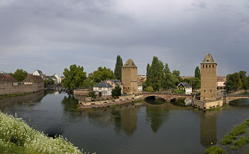 Panoramic view of the Petite France canal district, as well as the historic Ponts Couverts and fortified towers in Strasbourg