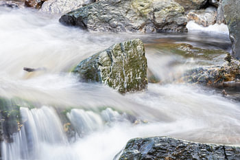 Stone in wild river