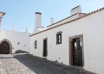 street with typical white houses in monsaraz Portugal