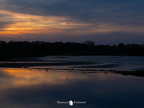 Zonsondergang boven het Kristalbad