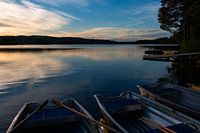 Evening at Safssjon Lake in Sweden with rowing boats ashore