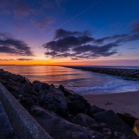 overzicht op de pier na zonsondergang van peterheinspictures
