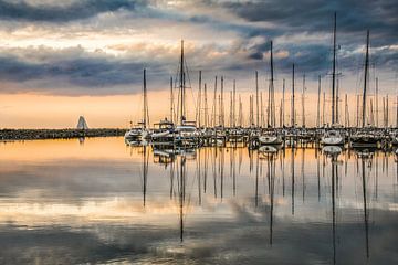 The port of Stavoren on a late late summer evening by Harrie Muis