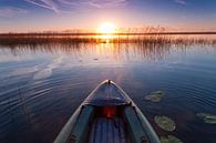 Kayak floats towards the rising sun, towards adventureSymbol of movement towards adventure. by Michael Semenov thumbnail