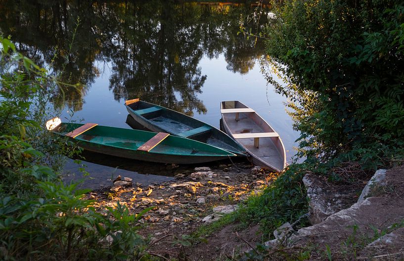 three wooden boats in the water in a river on a summer day by ChrisWillemsen