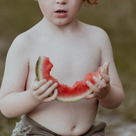Red-haired boy with watermelon by Kelly Vanherreweghen