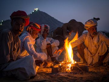 Camel traders at the campfire in Pushkar by Teun Janssen