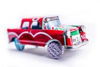 Oldtimer Cuban Red Car Closeup of handmade tin toy car in miniature form
