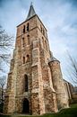 Kerktoren van de protestantse kerk in Domburg (Zeeland) van Fotografie Jeronimo thumbnail