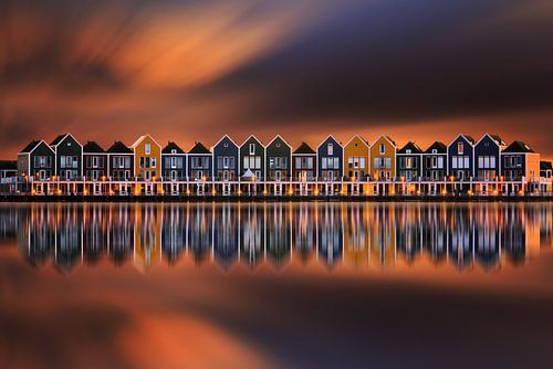 De huizen van Houten bij zonsondergang