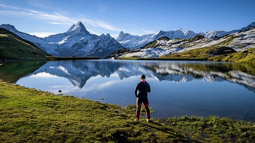 Mountain lake with hiker