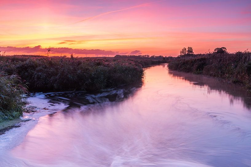 Prachtige zonsopkomst in natuurgebied Kruiszwin in Anna Paulowna van Bram Lubbers